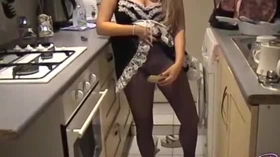 Merry blonde kazbxxx in maid uniform putting on a tampon